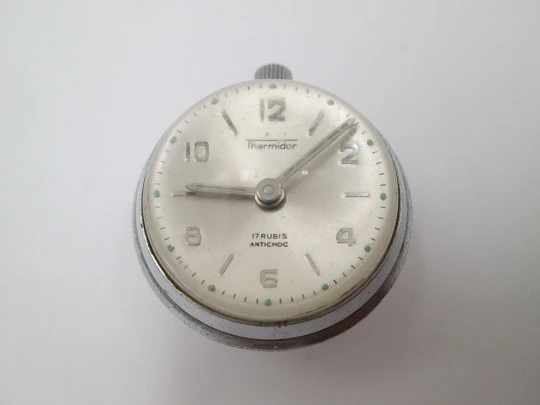 Reloj bola transparente Thermidor. Metal plateado. Cuerda manual. 17 gemas. 1970