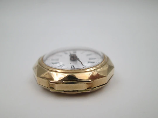 Reloj bolsillo decagonal oro amarillo 14k. Dial porcelana. Remontoir. Motivos florales. 1890