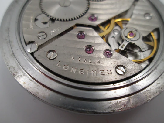 Reloj bolsillo Longines. Acero cromado. Cuerda manual. Estuche de madera. Suiza. 1960