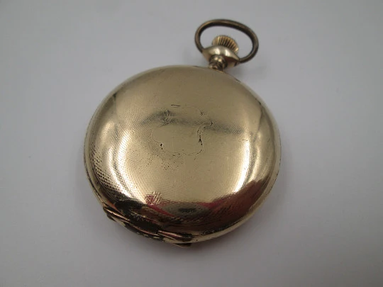 Reloj bolsillo saboneta Elgin. Chapado oro. Dial porcelana. Cuerda remontoir. 1920. Suiza