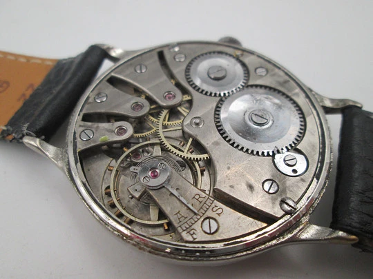 Reloj caballero Cyma Jumbo. Cuerda manual. Acero y metal plateado. Segundero. 1950