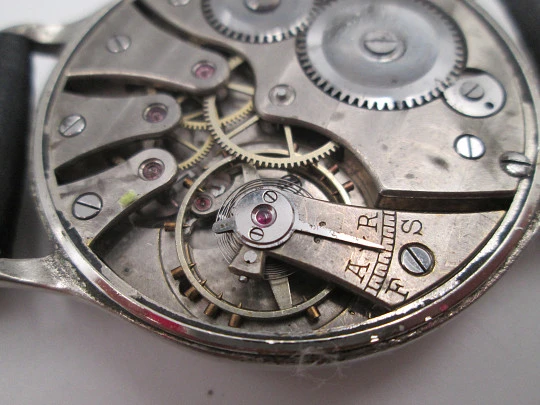 Reloj caballero Cyma Jumbo. Cuerda manual. Acero y metal plateado. Segundero. 1950