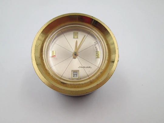 Reloj cilíndrico Jaguar. Bronce dorado y pavonado. Calendario. Cuerda. 1960