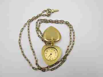 Reloj colgante corazón Lys. Metal dorado. Cuerda. Llave y cadena. 1970. Suiza