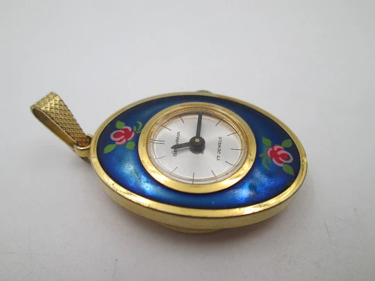 Reloj colgante Grovana. Metal dorado y esmalte de flores. Cuerda manual. Suiza. 1970 Reloj colgante Grovana. Metal dorado y esmalte de flores. Cuerda manual. Suiza. 1970