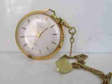 Reloj colgante Kienzle. Metal dorado. Cadena. Cuerda. Años 60