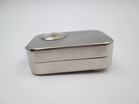 Reloj colgante R. Jaquet Genève con caja de música. Metal plateado. Cuerda manual. 1940