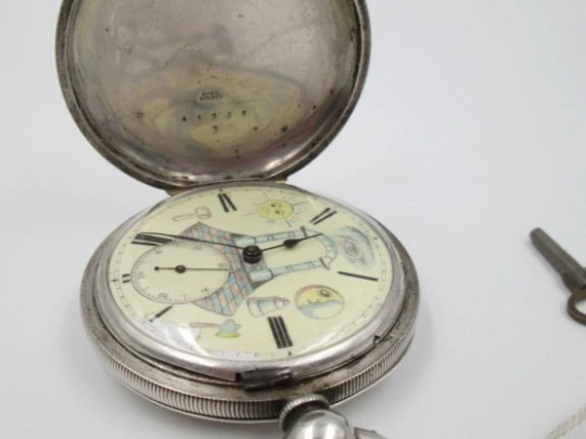 Reloj de bolsillo a llaves. Plata de ley. Esfera masónica. Siglo XIX. Segundero