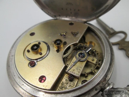 Reloj de bolsillo a llaves. Plata de ley. Esfera masónica. Siglo XIX. Segundero