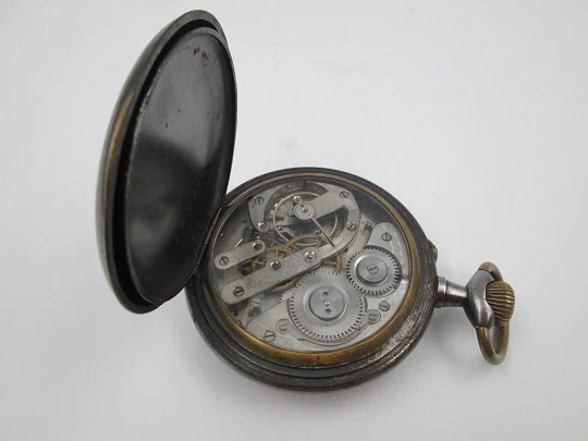 Reloj de bolsillo gran complicación. Hierro y metal dorado. Cuerda remontoir. 1900