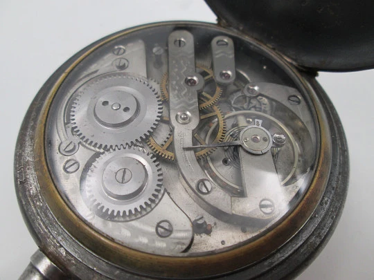 Reloj de bolsillo gran complicación. Hierro y metal dorado. Cuerda remontoir. 1900