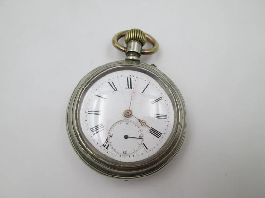 Reloj de bolsillo lepine. Metal plateado. Esfera porcelana. Segundero. 1900