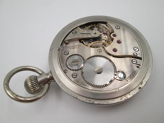 Reloj de bolsillo militar. Metal plateado. Esfera negra. Cuerda manual. Segundero. Suiza. 1940