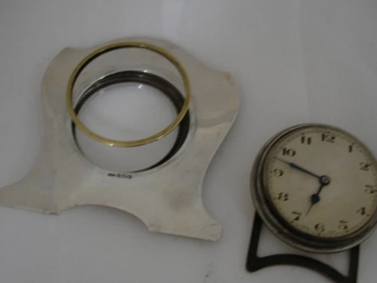 Reloj de sobremesa y despacho J. H. Williams. Plata de ley y bronce. Cuerda manual. 1920 Reloj de sobremesa y despacho J. H. Williams. Plata de ley y bronce. Cuerda manual. 1920