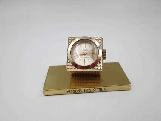 Reloj de sobremesa y viaje Rivo. Chapado en oro. Cuerda manual. Patrón diamante. Suiza Reloj de sobremesa y viaje Rivo. Chapado en oro. Cuerda manual. Patrón diamante. Suiza