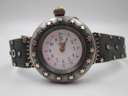 Reloj de transición de plata Hierro y Cía (Habana). Detalles chapados en oro. 1920