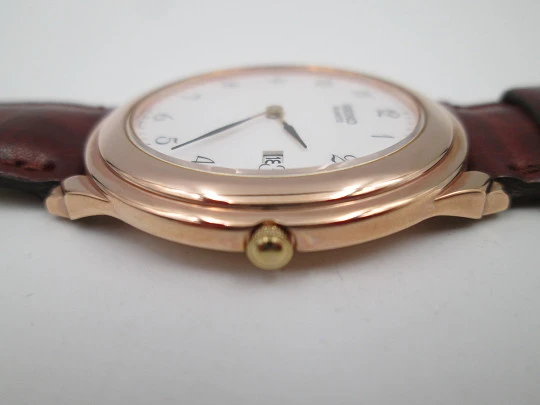 Reloj de vestir de cuarzo para caballero Seiko. Acero y chapado en oro. Calendario. 1980