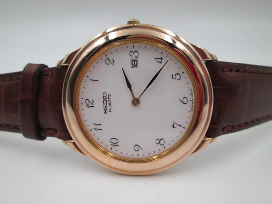 Reloj de vestir de cuarzo para caballero Seiko. Acero y chapado en oro. Calendario. 1980