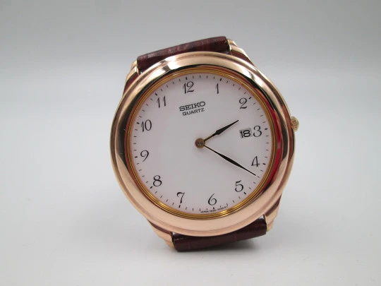 Reloj de vestir de cuarzo para caballero Seiko. Acero y chapado en oro. Calendario. 1980