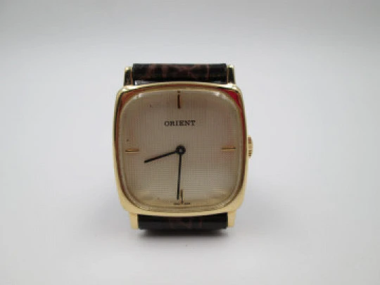 Reloj de vestir para mujer Orient. Chapado oro y acero inoxidable. Cuerda manual. 1980