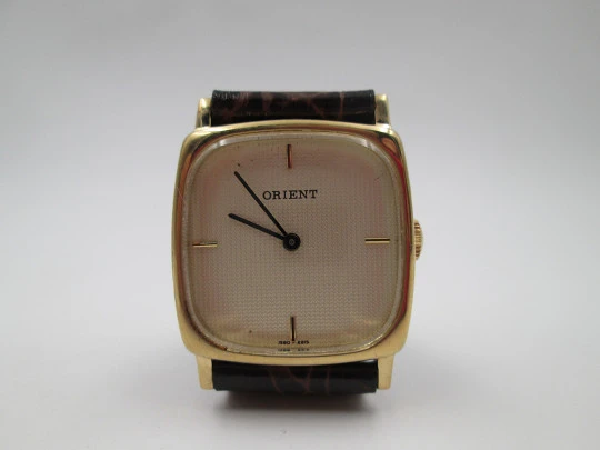 Reloj de vestir para mujer Orient. Chapado oro y acero inoxidable. Cuerda manual. 1980