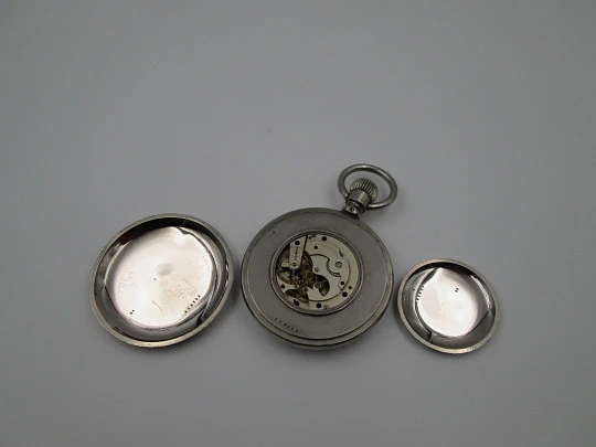 Reloj de viaje bolsillo Longines con estuche de piel. Acero cromado. Remontoir. 1910. Suiza
