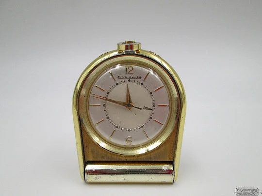 Reloj de viaje con alarma Jaeger LeCoultre Memovox. Chapado en oro. 1960. Suiza Reloj de viaje con alarma Jaeger LeCoultre Memovox. Chapado en oro. 1960. Suiza
