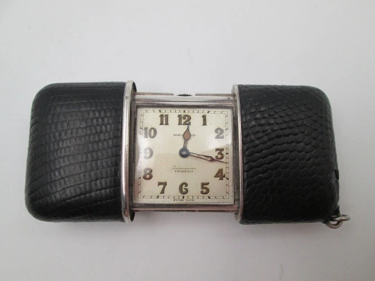 Reloj de viaje cronómetro Movado Ermeto. Plata de ley y piel serpiente. Cuerda. 1920