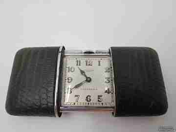 Reloj de viaje Movado Carassale. Plata 935. Cuerda. Funda piel. Años 50