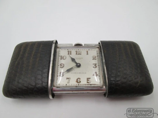 Reloj de viaje Movado Carassale. Plata de ley y piel de serpiente. Automático. 1940