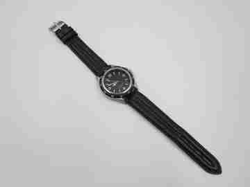 Reloj deportivo caballero. Metal y acero. Bisel negro. Cuarzo. Japón. 2000