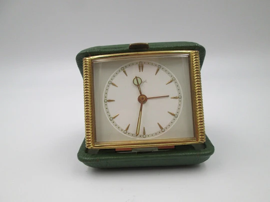 Reloj despertador de sobremesa y viaje Kienzle. Cuerda manual. Metal dorado Reloj despertador de sobremesa y viaje Kienzle. Cuerda manual. Metal dorado