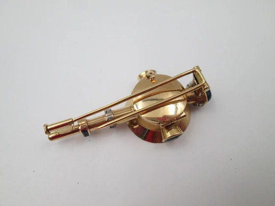 Reloj joya mecánico Movado. Oro 18k, diamantes, zafiros y esmeraldas. 1930
