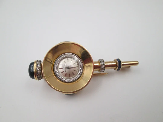 Reloj joya mecánico Movado. Oro 18k, diamantes, zafiros y esmeraldas. 1930
