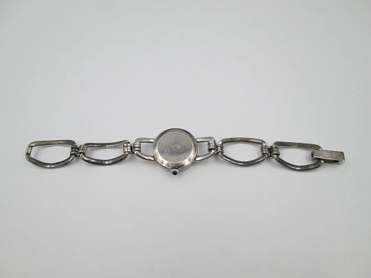 Reloj mecánico mujer Festina. Plata de ley. Brazalete. Esfera blanca. Suiza. 1980