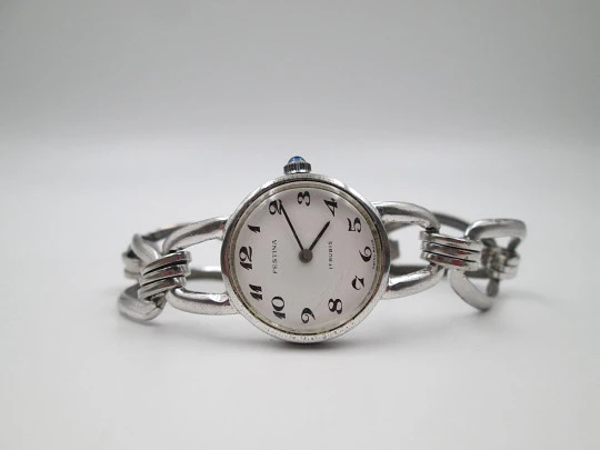Reloj mecánico mujer Festina. Plata de ley. Brazalete. Esfera blanca. Suiza. 1980