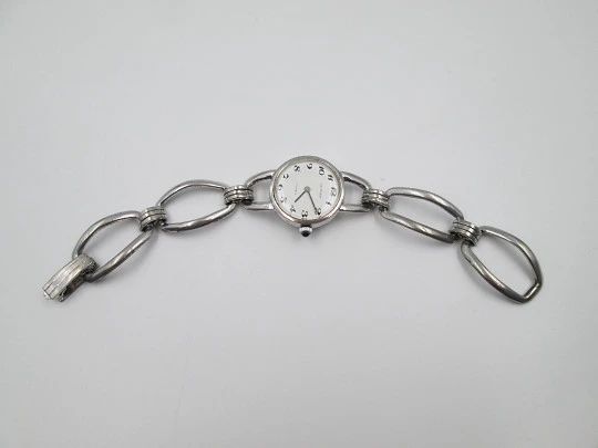 Reloj mecánico mujer Festina. Plata de ley. Brazalete. Esfera blanca. Suiza. 1980