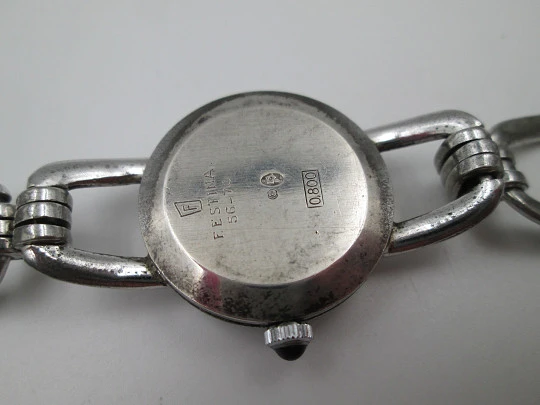 Reloj mecánico mujer Festina. Plata de ley. Brazalete. Esfera blanca. Suiza. 1980