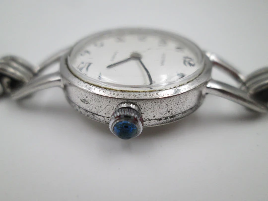 Reloj mecánico mujer Festina. Plata de ley. Brazalete. Esfera blanca. Suiza. 1980