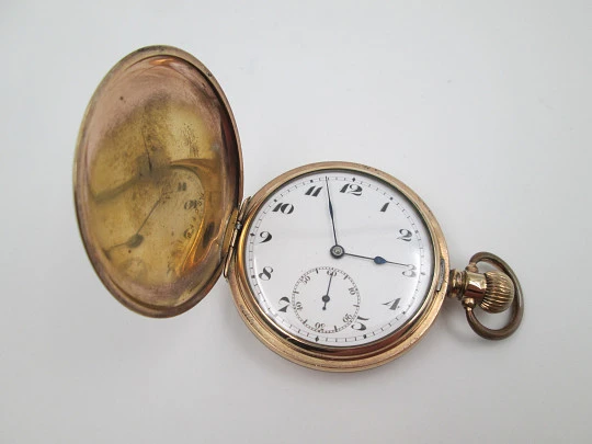 Reloj saboneta Horos. Metal chapado oro. Dial porcelana. Remontoir. Inglaterra / Suiza. 1920