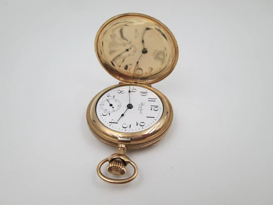 Reloj saboneta Standard. Chapado en oro. Dial porcelana. Cuerda remontoir. 1910. EEUU