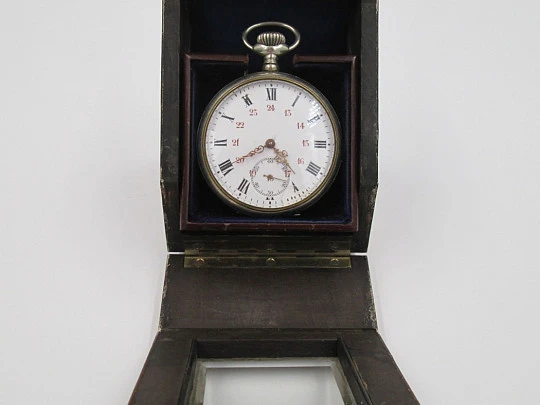 Relojera de sobremesa. Bronce, madera de raíz y cristal biselado. 1910
