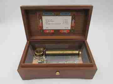 Reuge Sainte Croix 4 song swiss wind-up mechanism music box. Wood and bronze