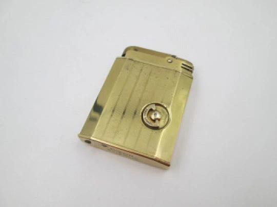 Reuge Slam Song petrol musical lighter. Gold plated. Vertical stripes pattern. Swiss. 1950's