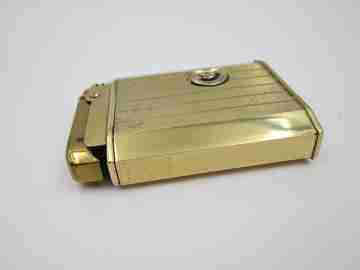 Reuge Slam Song petrol musical lighter. Gold plated. Vertical stripes pattern. Swiss. 1950's