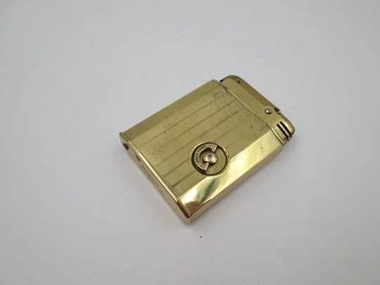 Reuge Slam Song petrol musical lighter. Gold plated. Vertical stripes pattern. Swiss. 1950's