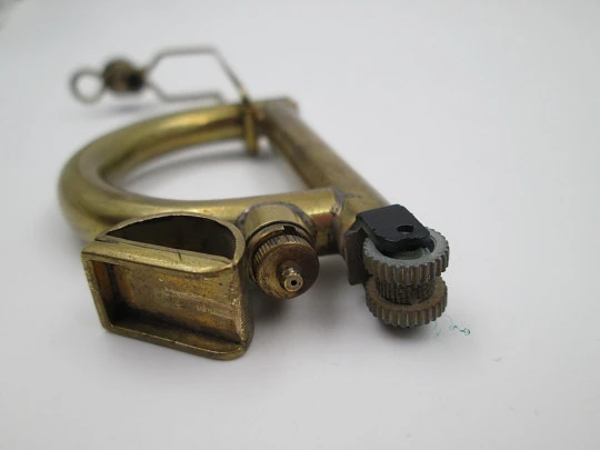 Ritter wick petrol pocket lighter. Gold plated metal. Harp shape. Germany. 1970's Ritter wick petrol pocket lighter. Gold plated metal. Harp shape. Germany. 1970's