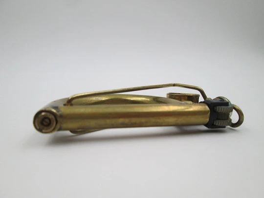 Ritter wick petrol pocket lighter. Gold plated metal. Harp shape. Germany. 1970's Ritter wick petrol pocket lighter. Gold plated metal. Harp shape. Germany. 1970's