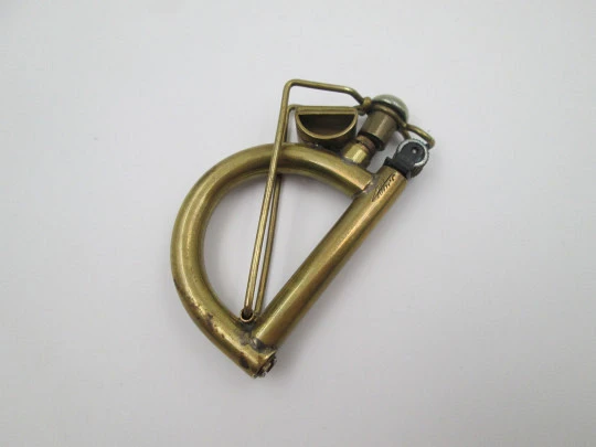 Ritter wick petrol pocket lighter. Gold plated metal. Harp shape. Germany. 1970's Ritter wick petrol pocket lighter. Gold plated metal. Harp shape. Germany. 1970's