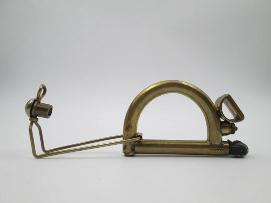 Ritter wick petrol pocket lighter. Gold plated metal. Harp shape. Germany. 1970's